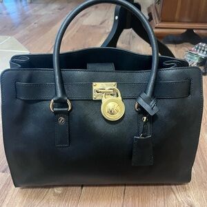 Michael Kors lock and key leather bag
